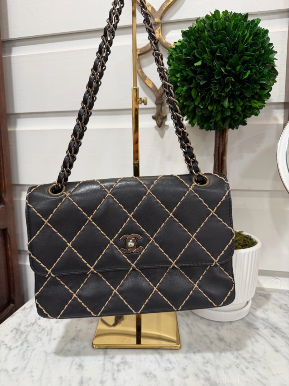 CHANEL Black Quilted Shoulder Bag with Tan Contrast Stitching and Chain Strap
